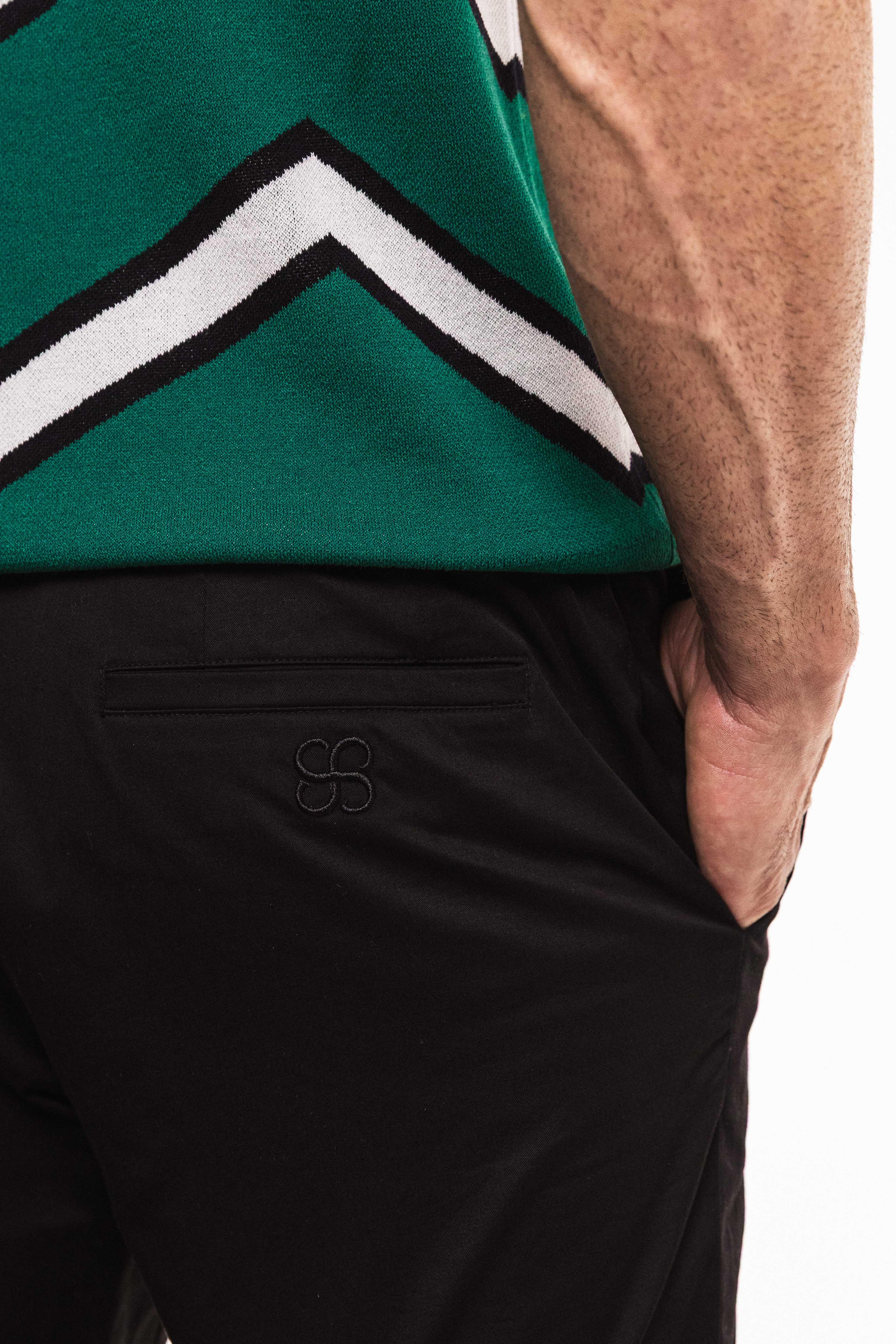 SEAM Tailored Cotton Trouser in Obsidian, side view showing pocket detail and tailored fit