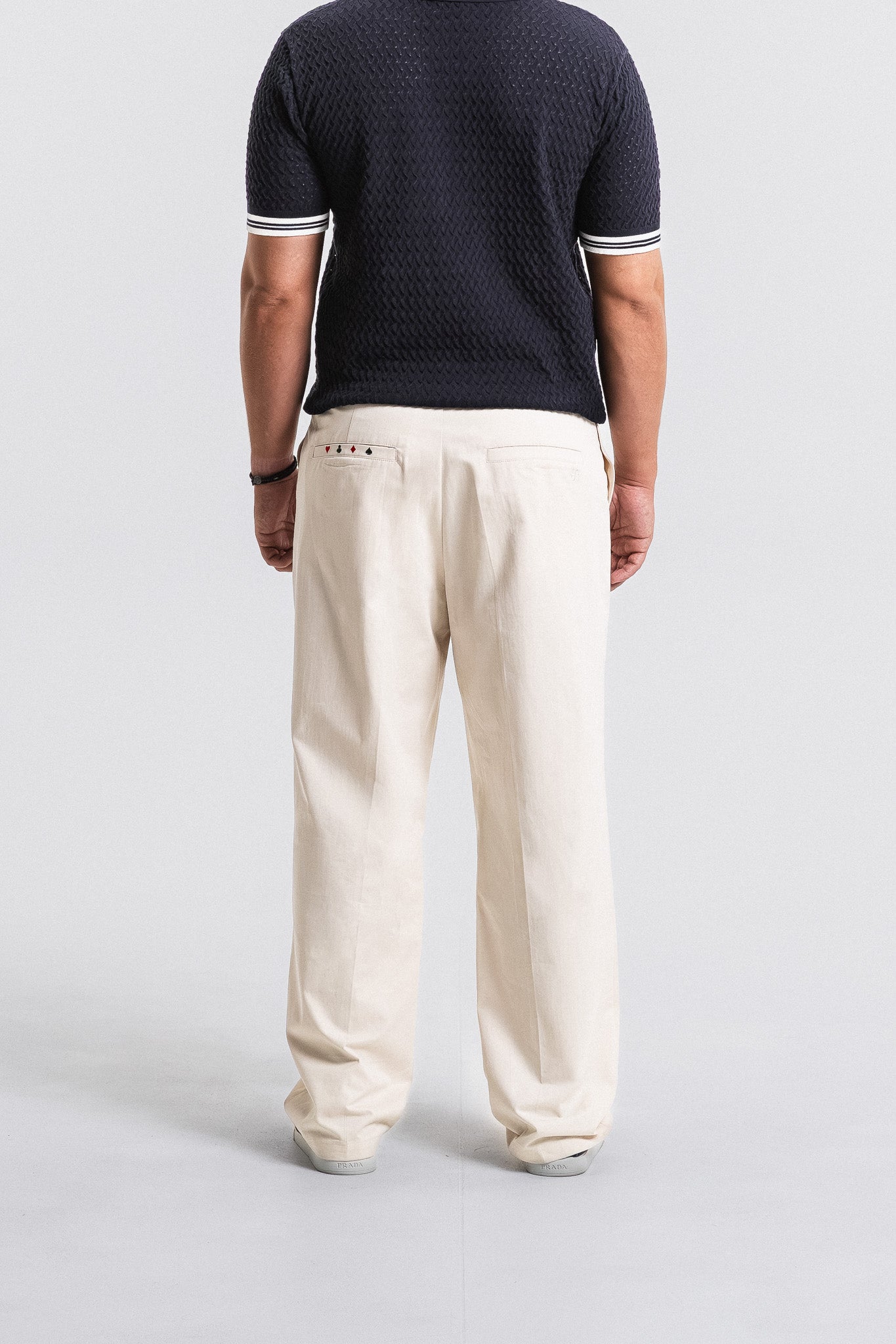 SEAM Poplin Pleated Trouser in Wheat, full outfit view with navy polo