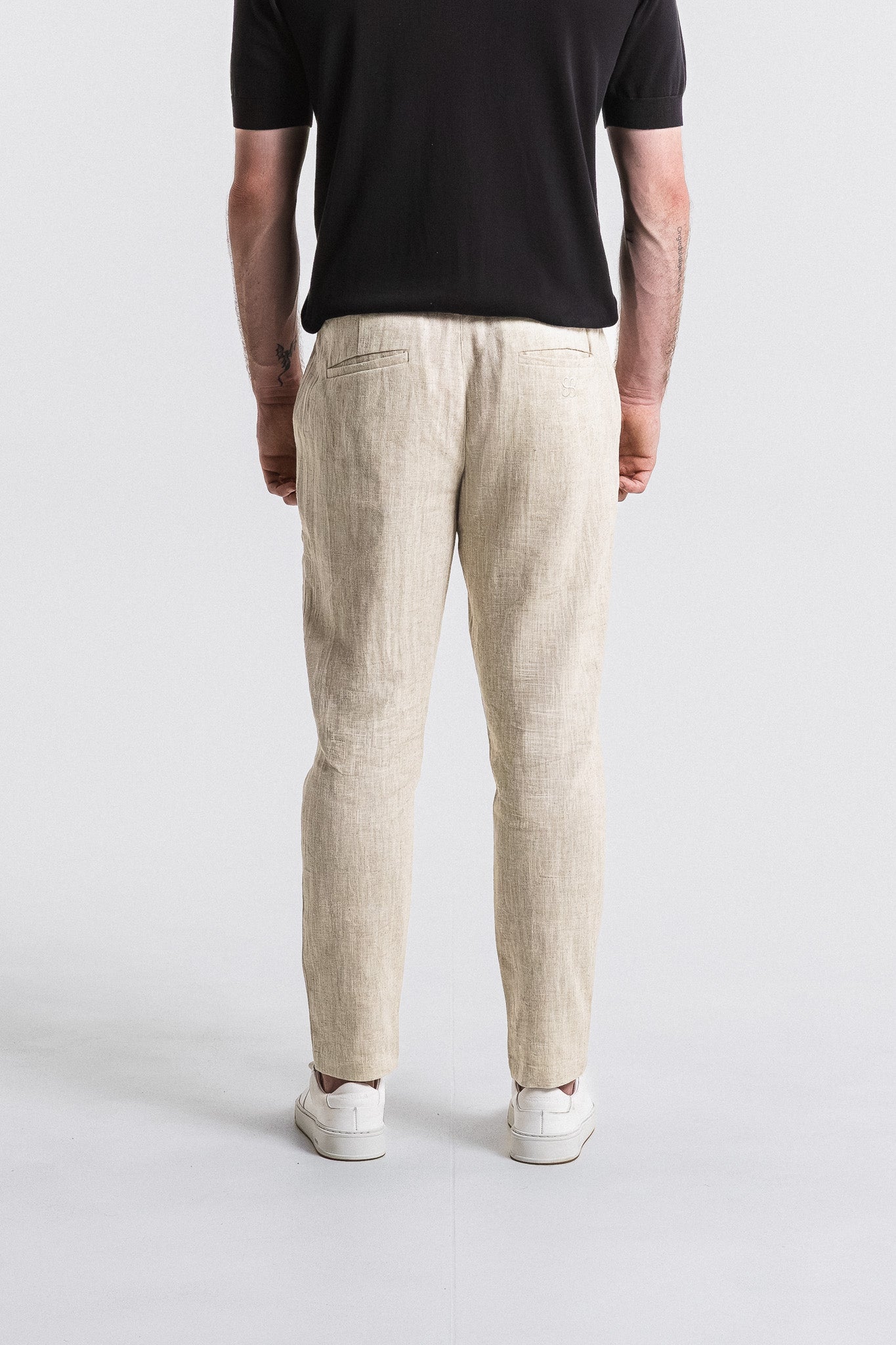 SEAM Tailored Lounge Linen Pant in Wheat, full outfit view with black polo