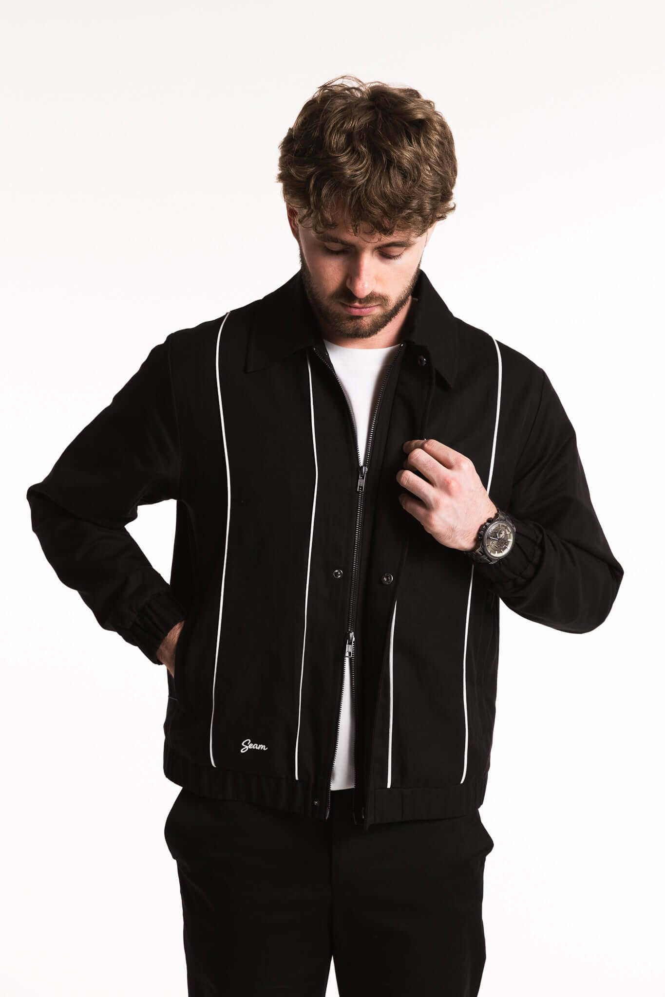 Cotton Contrast Jacket featuring tailored silhouette with contrasting white piping and elasticated cuffs for comfort.