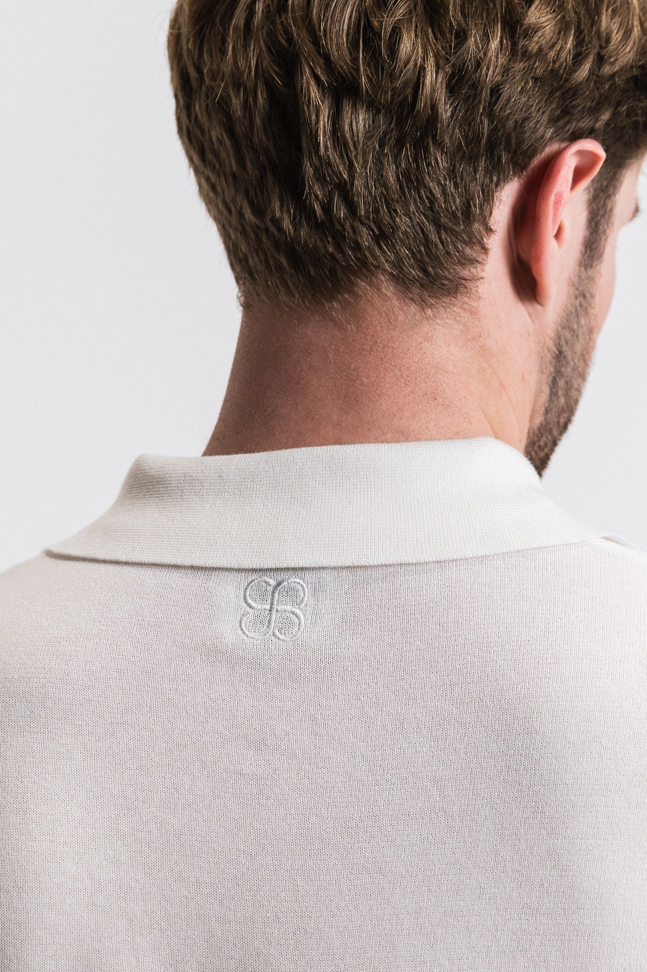 SEAM Cotton Knit Open Neck Polo in White, detail of collar and jacquard cotton texture