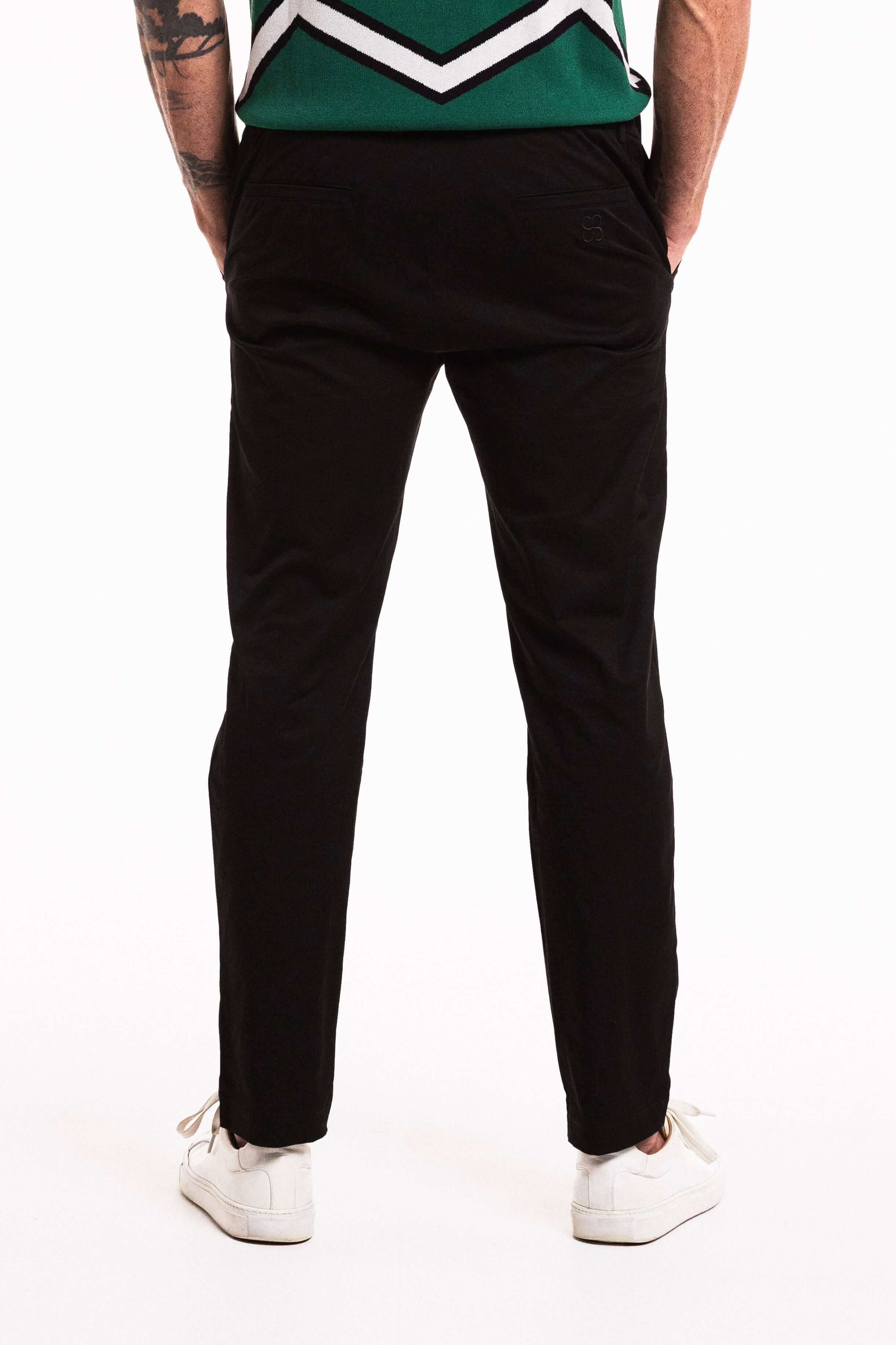 SEAM Tailored Cotton Trouser in Obsidian, back view showing straight-leg silhouette