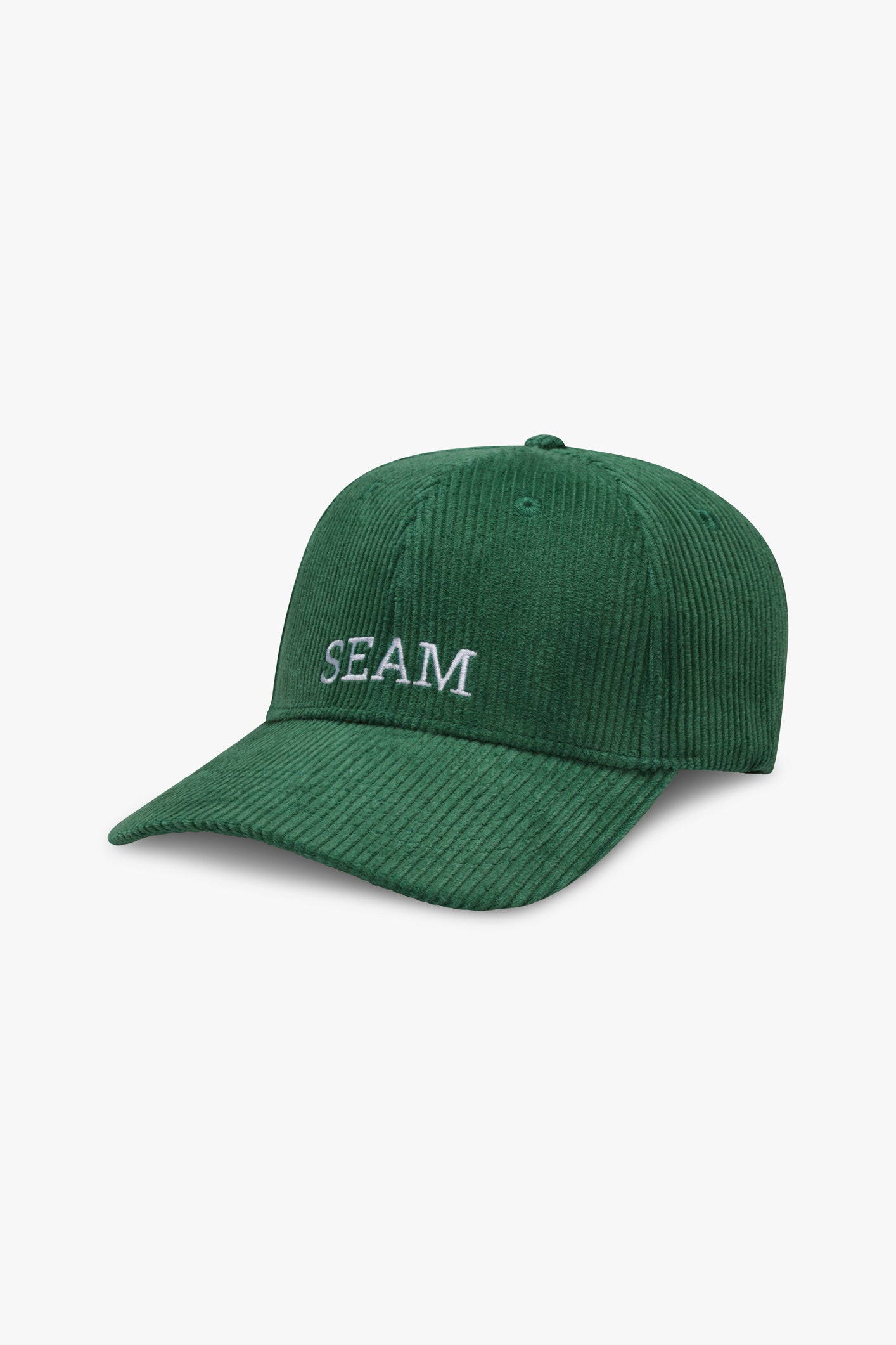 SEAM Corduroy Logo Cap in Forest Green, side view showing structured six-panel build